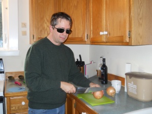 he swears the glasses protect his eyes from onions